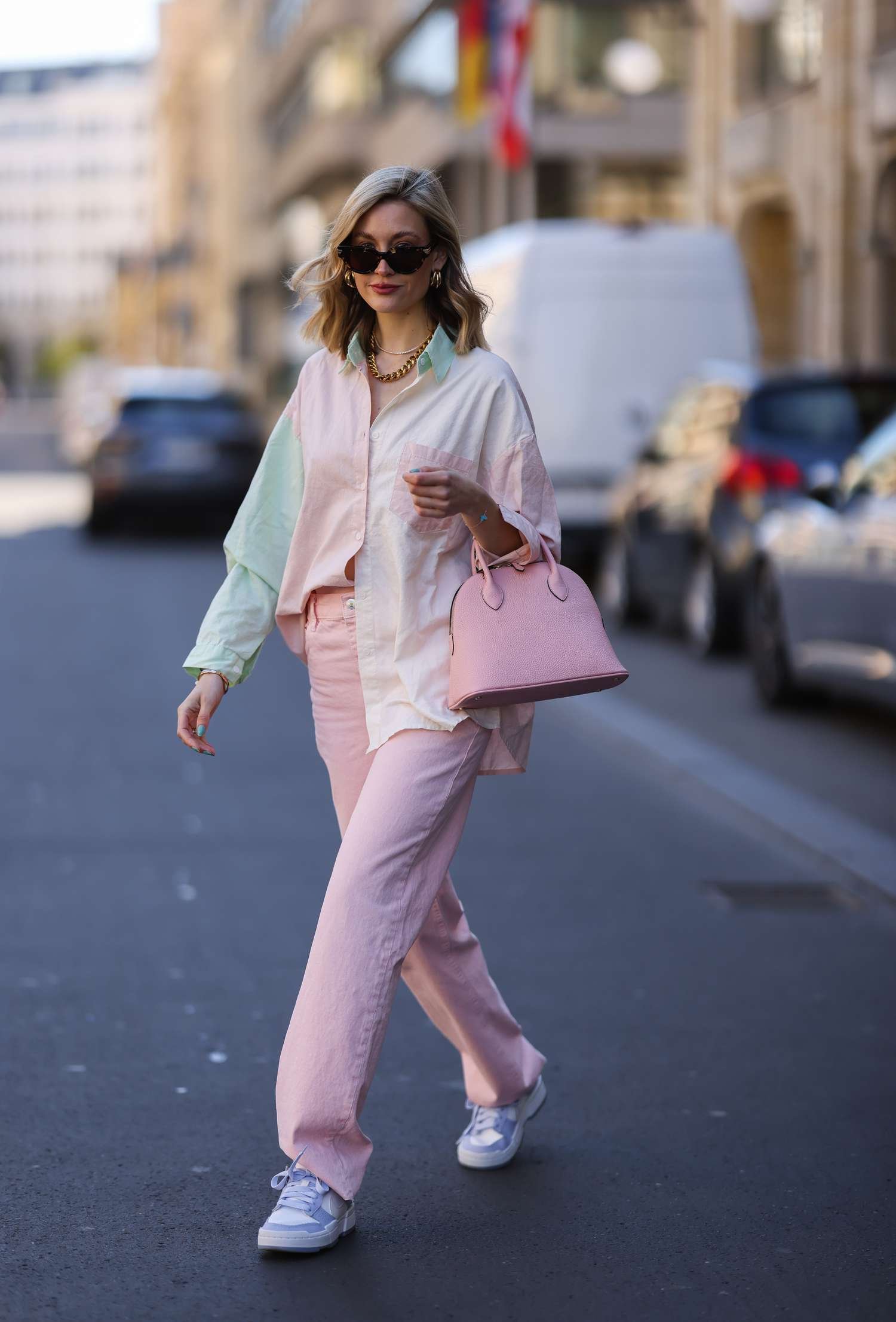 Person wear pink blue jean and angstrom color block conservative shirt