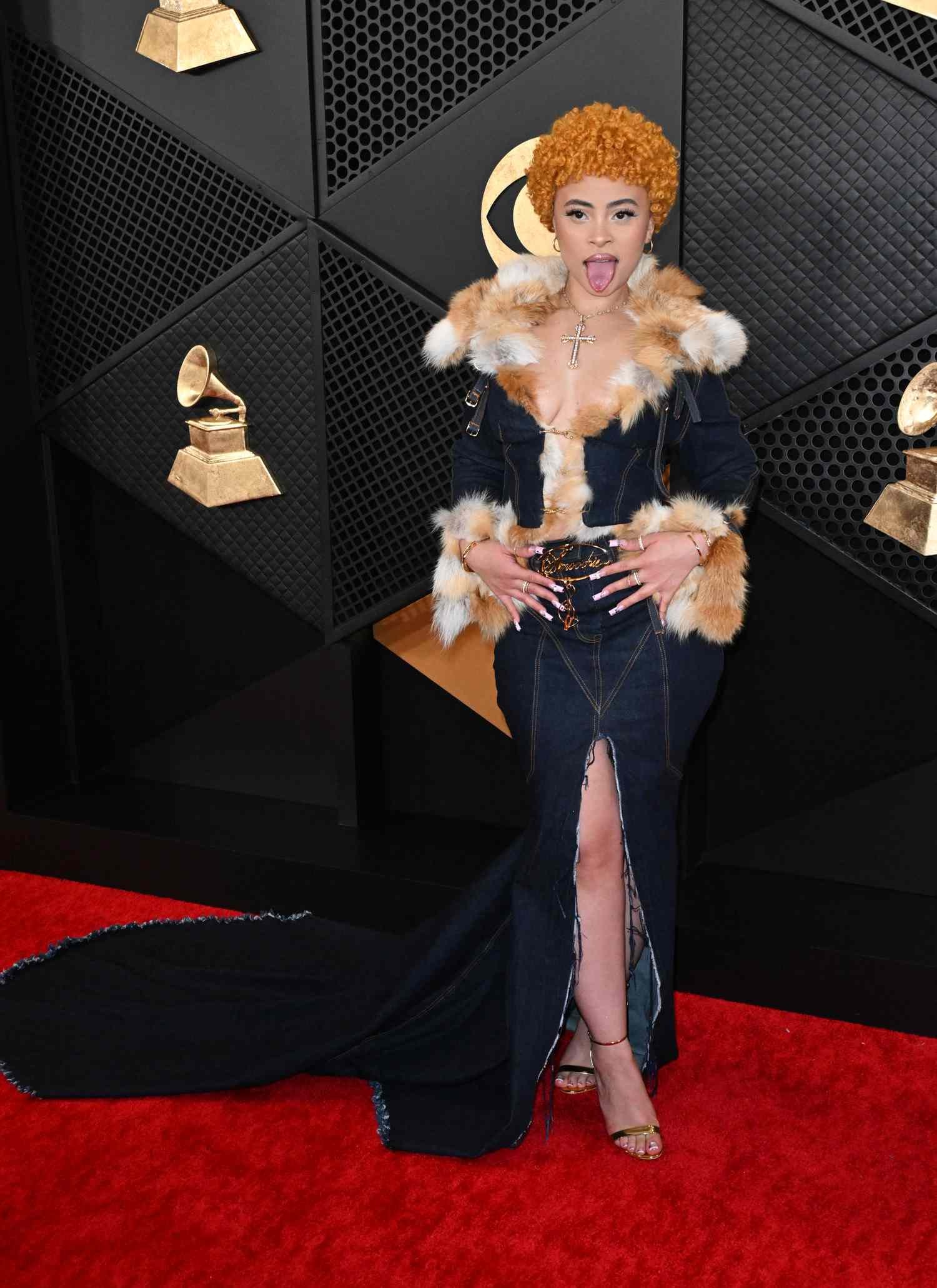 US rapper Ice Spice come for the 66th annual Grammy Awards in A denim Baby Phat two piece set