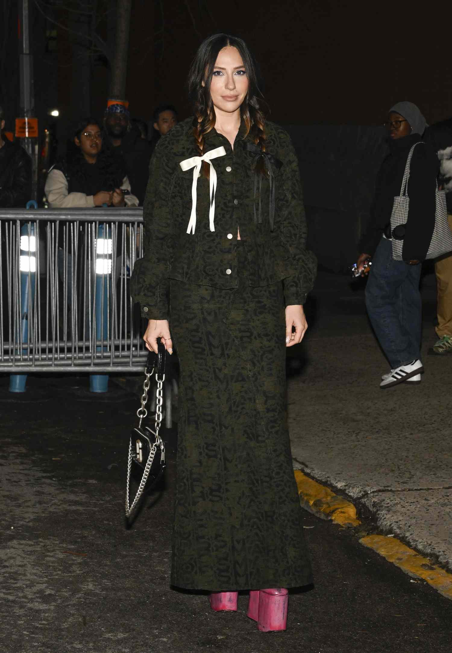 Tefi Pessoa wear a Marc William Wymark Jacobs dress during NYFW, one of the best NYFW 2024 street style outfits. 