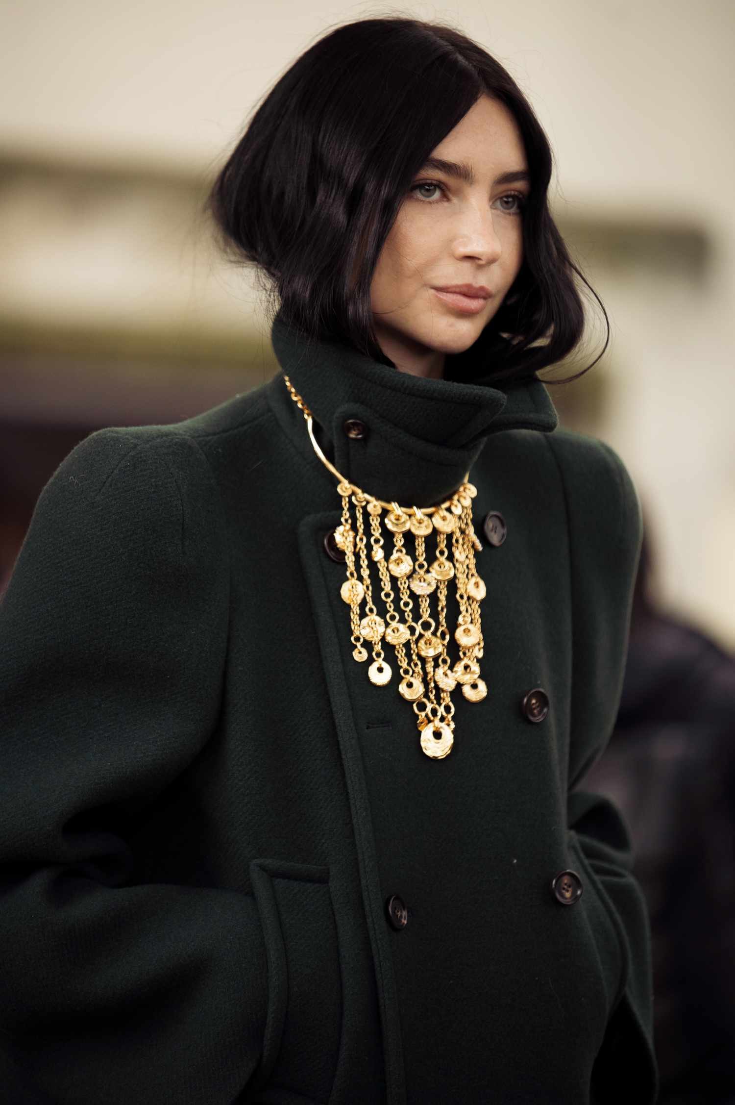 Meadow Walker wears a black coat and a gold necklace exterior the Chloe show during Womenswear Spring/Summer 2025 as part of capital of France Fashion Week on September 26, 2024 in Paris, France. 