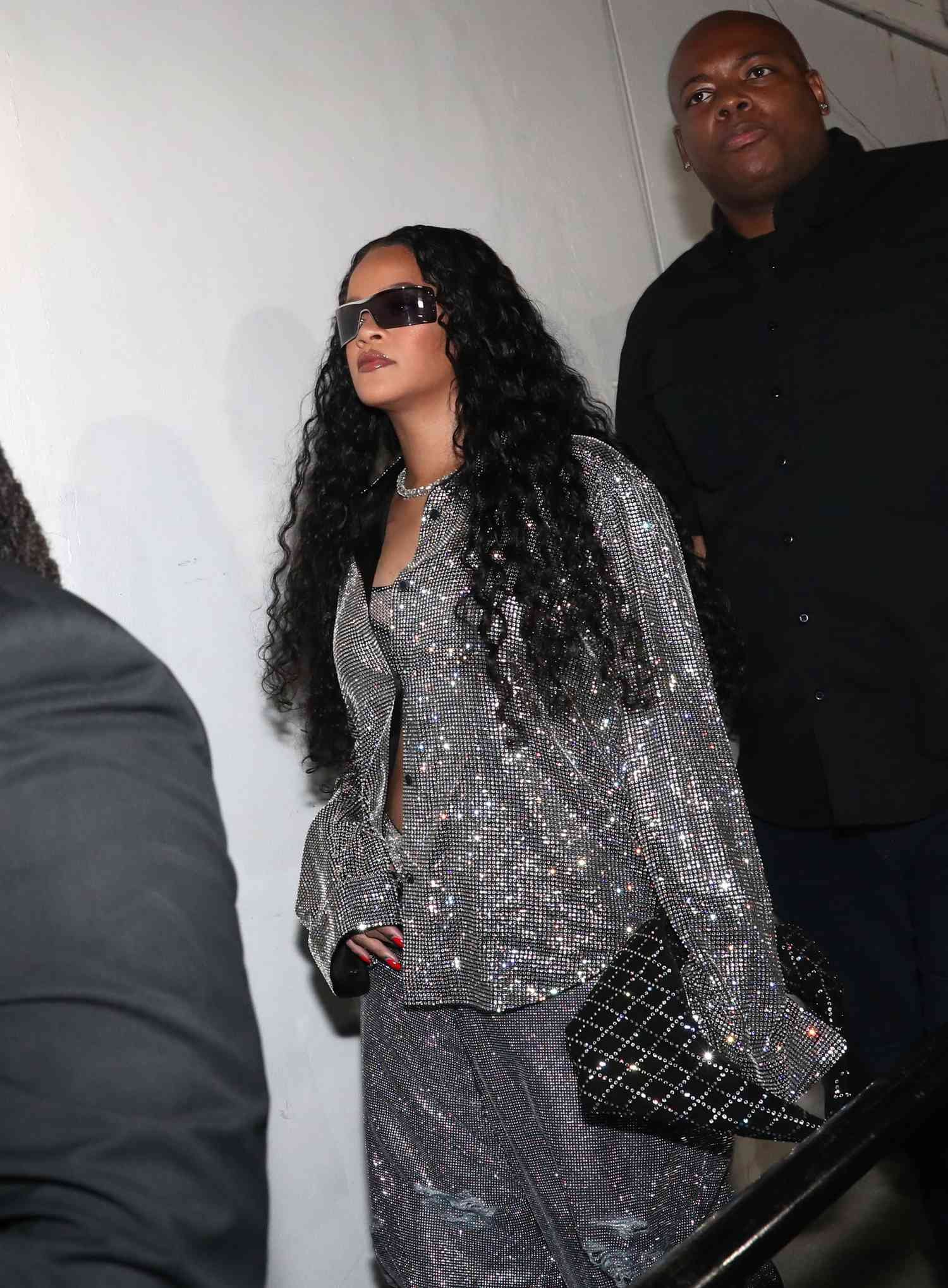 Rihanna wearing Khaite frothy silver agree set