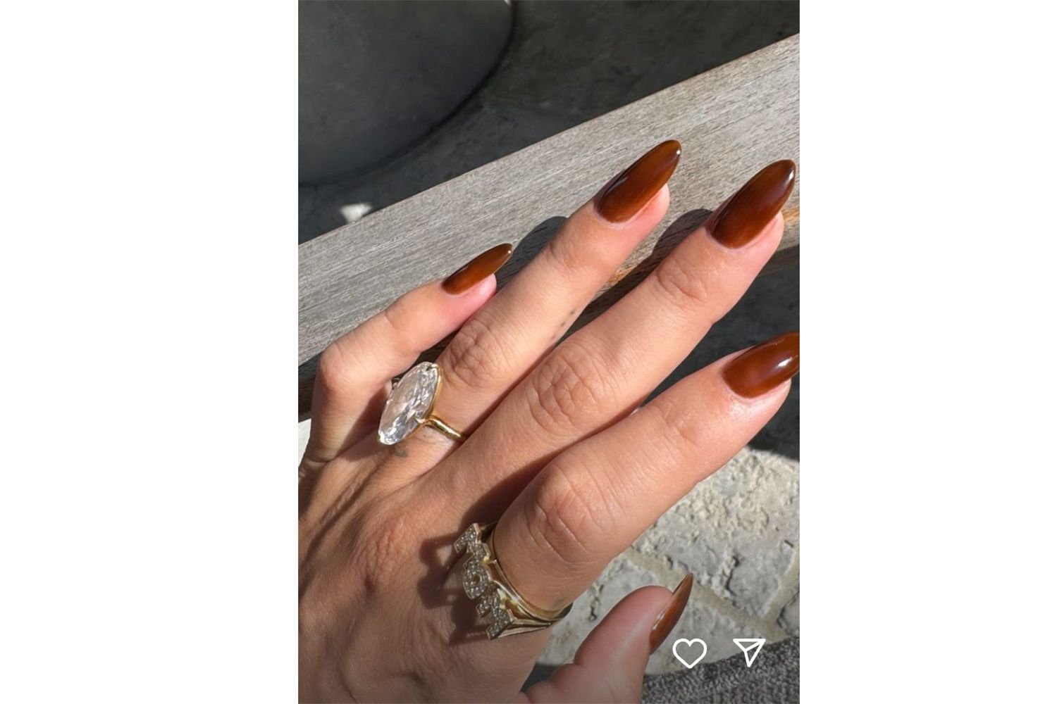 hailey bieber's hand with usage mom ring